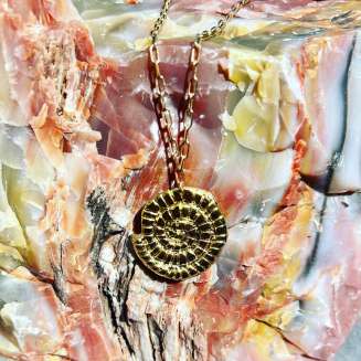 Gold Vermeil 16” + 2 “ extension chain with nautilus shell design pendant that measures 1.25” in diameter.
