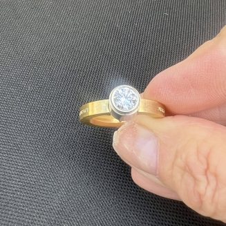 Bezel set 6mm white Cubic Zirconia in sterling Silver and 24k Gold Vermeil size 8 only