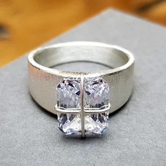 RING SILVER "PRESENT WRAP" SLIM BAND, 10x8mm CLEAR CZ SIZE 7 ONLY