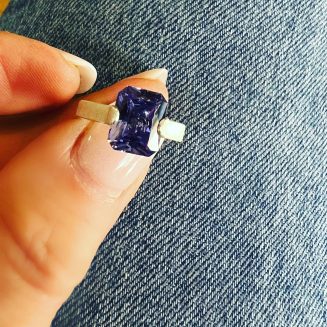 7X9 EMERALD CUT TANZANITE CZ WITH BEAUTIFUL SOFT SATIN FINISH STERLING SILVER BAND.  AVAILABLE IN SIZE 6 AND 7 ONLY