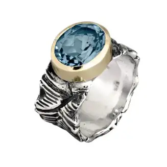 STERLING SILVER RING  AND 14K GOLD BEZEL SET BLUE TOPAZ
