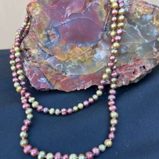 48" Freshwater Pearls strand alternating in berry brown color with pistachio